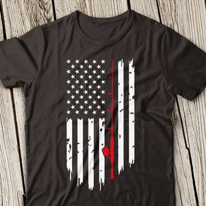 May include: A black t-shirt with a distressed American flag design featuring a red fishing rod and a white fish.