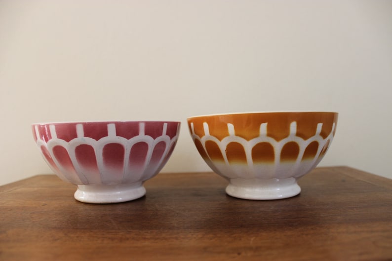 2 vintage pink and brownorange faceted bowls