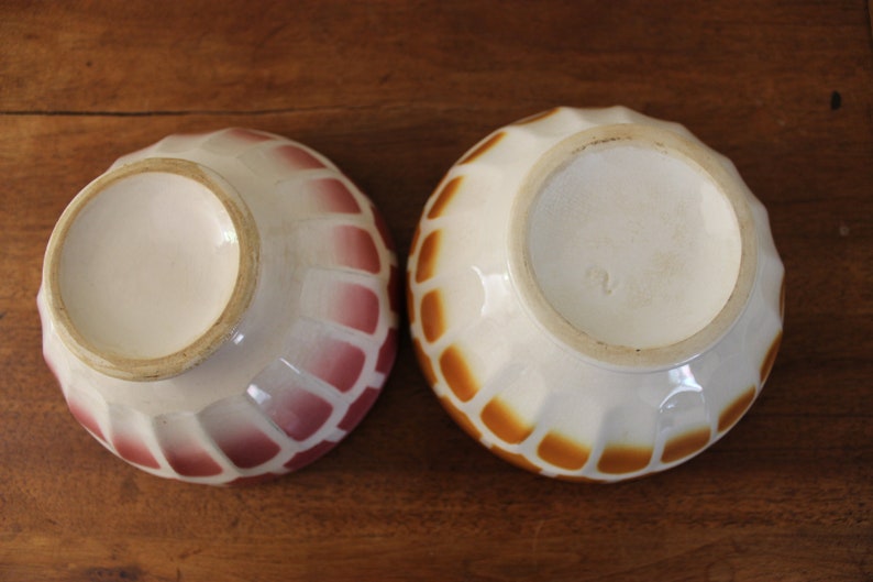2 vintage pink and brownorange faceted bowls