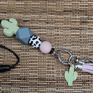 Cactus and Cow Print badge lanyard