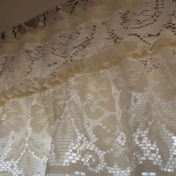 Holly: a vintage 2 piece lace curtain set. Features a left and right swag. Each measures 41 x 27