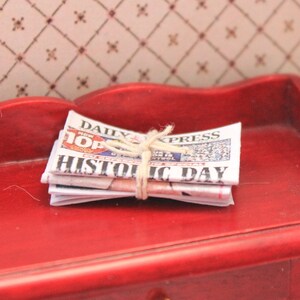 Pile of newspapers/ newspapers tied in a bundle image 3