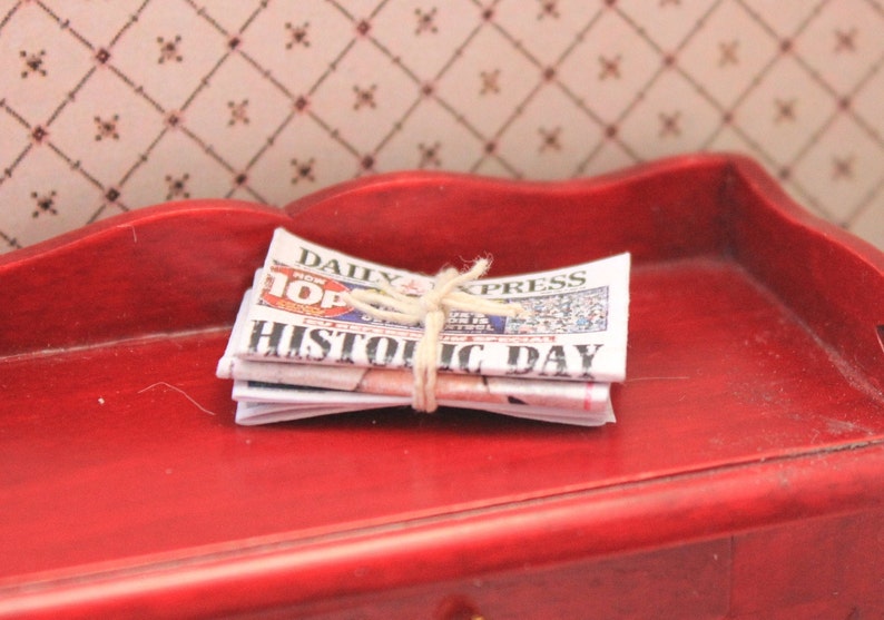 Pile of newspapers/ newspapers tied in a bundle image 3