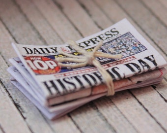 Pile of newspapers/ newspapers tied in a bundle