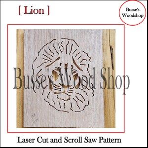 May include: A laser cut and scroll saw pattern of a lion's face on a light brown wooden board. The pattern is cut out of the wood, leaving the lion's face in negative space. The board is surrounded by a light brown wooden frame.