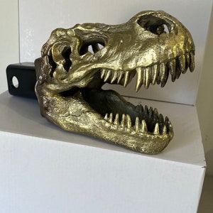 Gold T-Rex skull trailer hitch cover