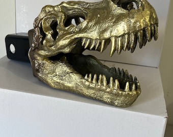 Złota osłona zaczepu przyczepy z czaszką T-Rexa