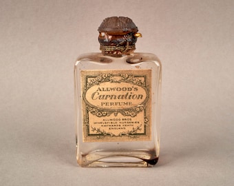 Antyczny szklany flakon na perfumy Carnation Baccarat marki Allwoods w stylu art déco z lat 30. XX wieku.