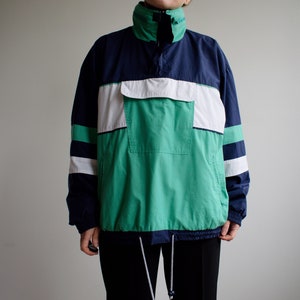 Vintage pullover windbreaker jacket. Originally women’s size M / L. 90’s era.