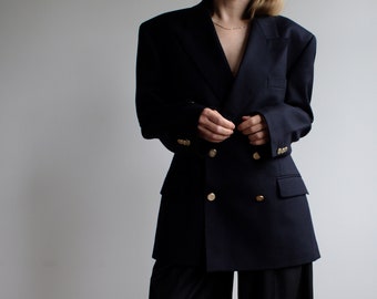 Vintage double breasted navy blue blazer. Originally men’s size M. 90’s era.