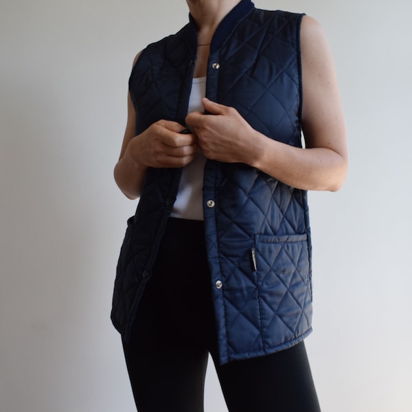 Vintage liner quilted vest jacket. Originally women’s size S. 90’s era.