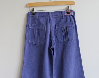 Vintage low rice flared blue jeans. Originally women’s size XS /S. 70’s era.