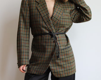 Vintage Yves Saint Laurent wool / cashmere blazer. Originally men’s size S. 90’s era.