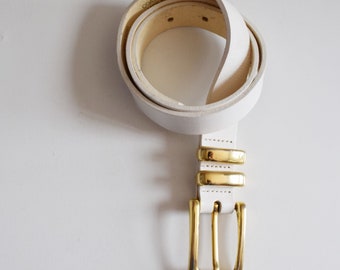 Vintage white leather belt. Originally women’s size 23’ - 25’. 90’s era.