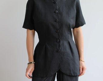 Vintage black linen short sleeve blazer. Originally women size M. Late 90’s era.