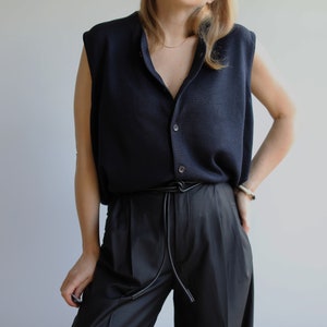 Vintage dark navy blue vest. Originally men’s size L. 90’s era.