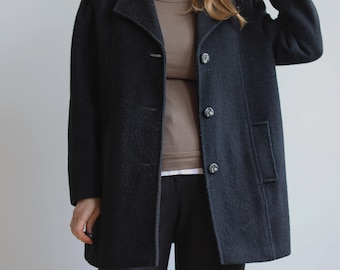Abrigo vintage de lana negra carbón. Originalmente talla M de mujer. Época de los 90.