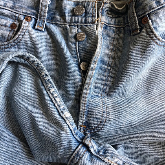 Vintage Levi’s mid rise 502 light wash jeans. Ori… - image 9