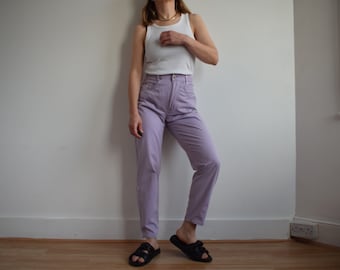 Vintage high waisted light jeans. Originally women’s waist size 26’. 90’s era.