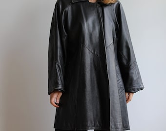 Vintage black leather coat. Originally women’s size S. Early 90’s era.