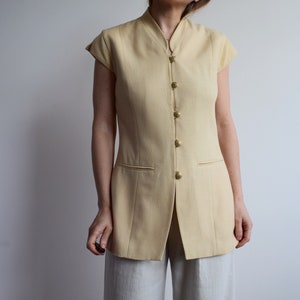 Vintage short sleeve blazer / vest. Originally women’s size S / M. Late 80’s / early 90’s.