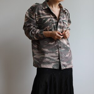 Vintage army camouflage jacket. Originally men’s size M. 90’s era.