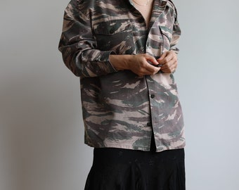 Vintage army camouflage jacket. Originally men’s size M. 90’s era.