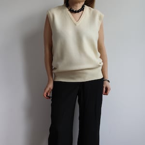 Vintage cream wool vest. Originally women’s size M. 90’s era.