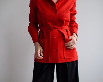 Vintage wool belted blazer in red. Originally women’s size S / M. Early 90’s era.