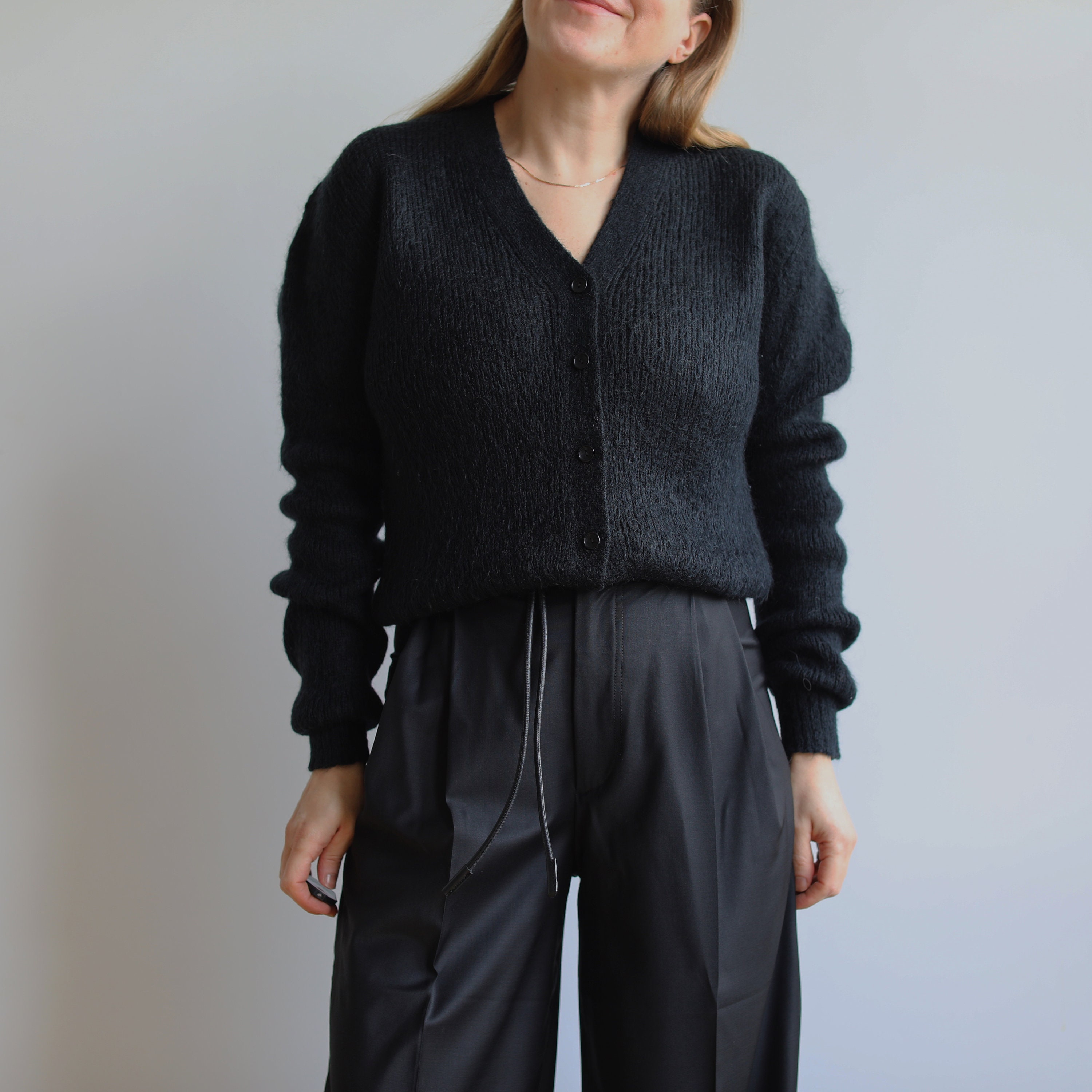Vintage black mohair wool cardigan. Originally women’s size M. 90’s era. Vintage black mohair wool cardigan. Originally women’s size M. 90’s era.