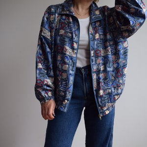 Vintage silk bomber jacket. Originally women’s size M. 90’s era.