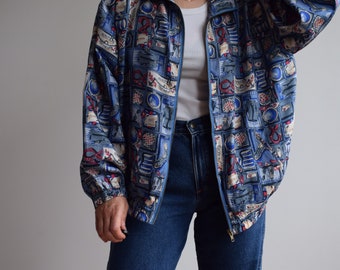 Chaqueta bomber de seda vintage. Originalmente talla mujer M. 90's era.