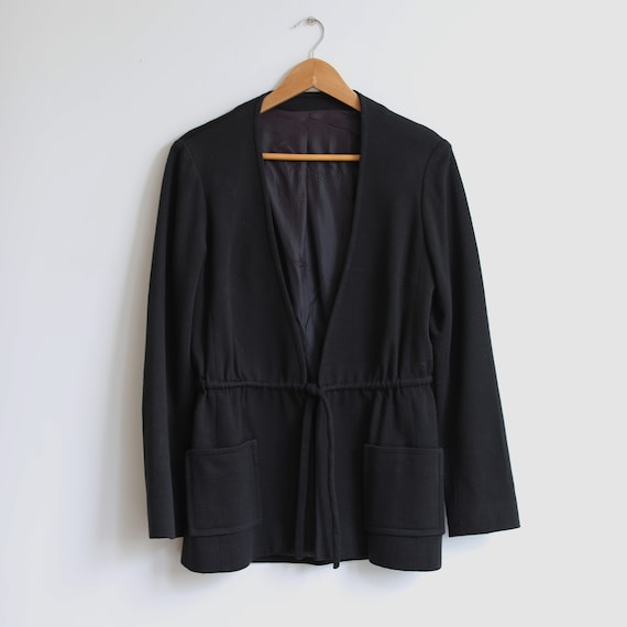 Vintage black wool Italian blazer. Originally women’s size S. 90’s era.