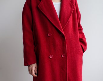 Vintage wool coat in red. Originally women’s size M. Late 80’s era.