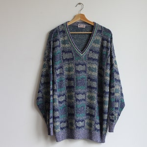 Vintage V neck jumper. Originally men’s size XL. 90’s era.