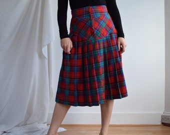 Vintage Italian wool midi skirt. Originally women’s size S. 70’s era.