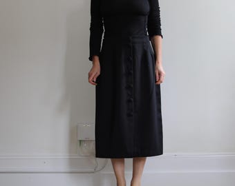 Vintage black midi skirt. Originally women’s size large M / small L. 90’s era.m