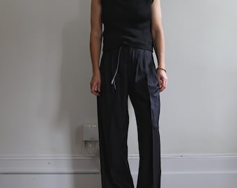 Vintage schwarze gestrickte schwarze Weste Top. Ursprünglich Damengröße S.