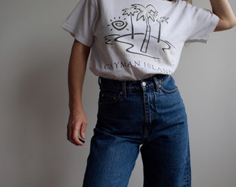 tee shirt blanc vintage. A l'origine taille homme M. Epoque années 90.