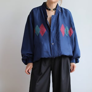 Vintage silk bomber jacket. Originally men’s size XL. 90’s era.