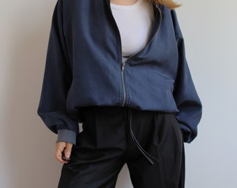 Vintage navy blue silk bomber jacket. Originally women’s size XL. 90’s era.