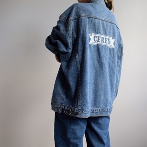 Vintage denim jacket. Originally men’s size XL. 90’s era.