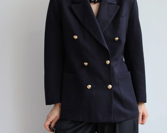 Vintage dark navy blue double breasted wool blazer. Originally women’s size S. 90’s era.