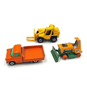 Lot of Vintage (1970s) Lesney Matchbox Trucks - Ford Transit, Big Bull Dozer, Sambron Jacklift