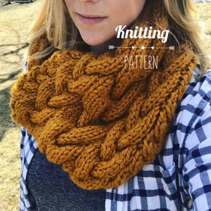 May include: Mustard yellow knitted infinity scarf with a thick, braided cable design. The scarf is made of chunky yarn and is displayed around a person's neck. The words "Knitting Pattern" are written in white script across the top of the image.