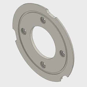 May include: A light gray, circular metal component with a central hole and four smaller, evenly spaced holes. The outer edge features two notches. The component has a three-dimensional appearance, suggesting it is a mechanical part.
