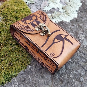 The Egyptian Magician tan leather tarot card case.  Handmade premium leather tarot deck box featuring Thoth, Winged Scarab, & Hieroglyphs