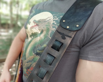 Deep Blue Ravens hand crafted thick premium leather guitar strap.  Fully adjustable sizing to fit your perfect custom height position.