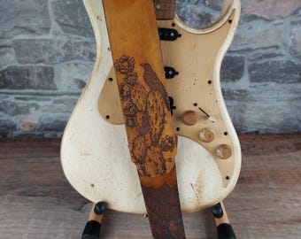 Desert Crow Leather Guitar Strap - Antique Tan. Handmade Instrument Strap With Raven, Cactus, Sand Dune. Adjustable sizing for custom height