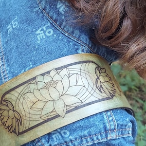 Handmade Leather Guitar Strap - Blue Lotus & Koi Fish. Hand crafted with thick premium leather. Fully adjustable sizing for custom height